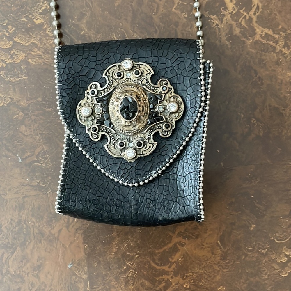 Black rhinestone adorned medallion purse